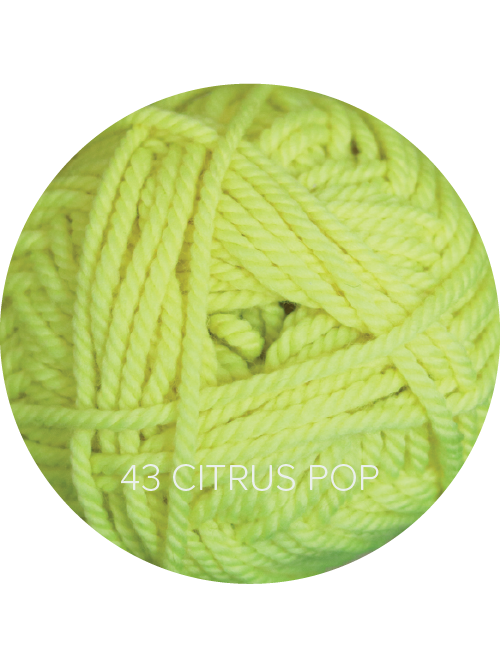 Close up on a neon yellow ball of Ewe Ewe Baa Baa Bulky yarn.