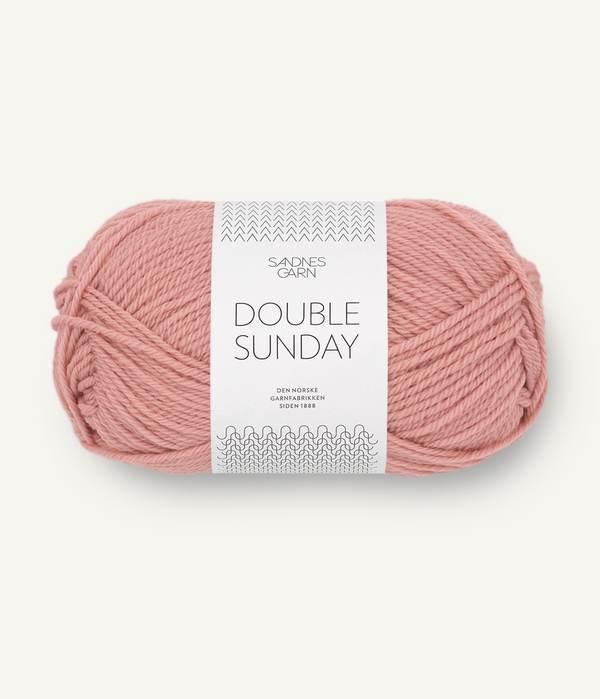 Warm pink ball of Sandnes Garn Double Sunday yarn.