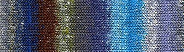 A swatch of striped fabric in blue and green tones.