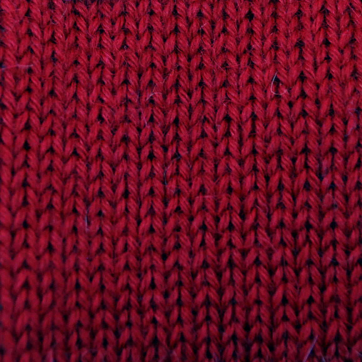 Red swatch knit with Alpaca Yarn Co. Classic Alpaca yarn.