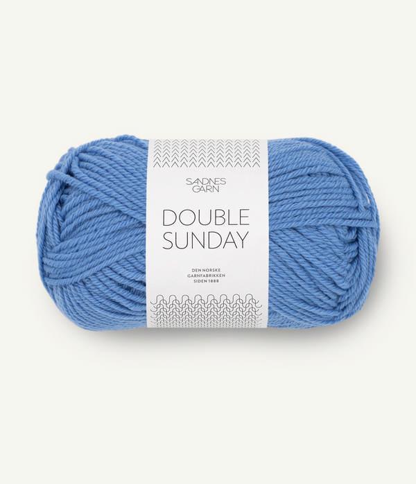 Bright blue ball of Sandnes Garn Double Sunday yarn.