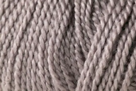Close up on a ball of taupe Jo Sharp Alpaca Kid Lustre yarn.