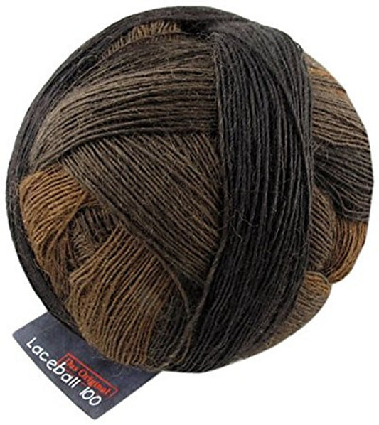 One ball of Schoppel-Wolle lace merino yarn in brown ombré.