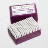 Purple case filled with white Knit Blockers.