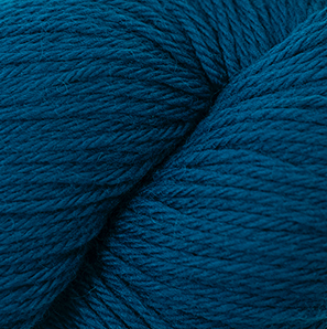 Close up on a teal skein of Cascade 220 Fingering yarn.