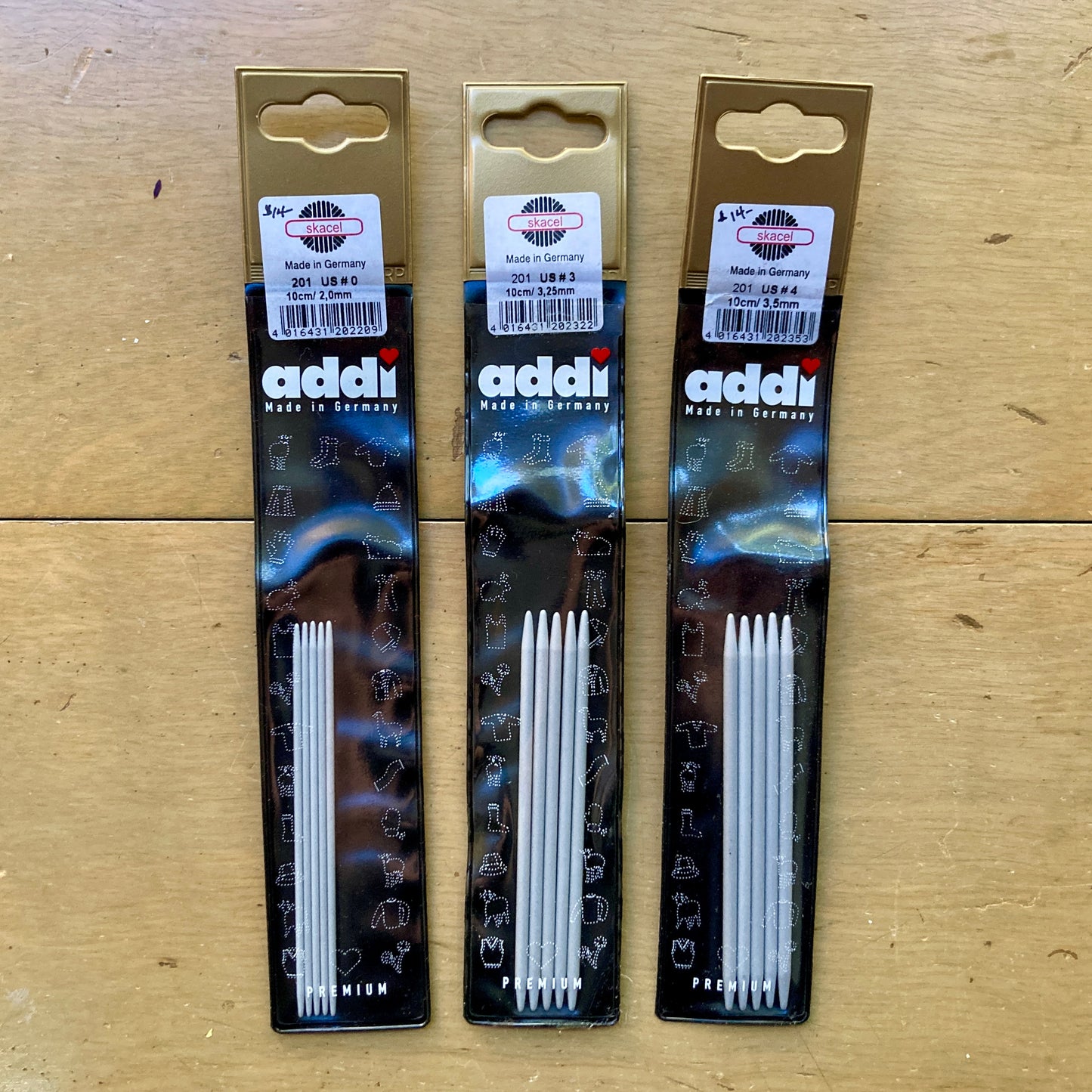 Three sets of Addi 4” double pointed needles