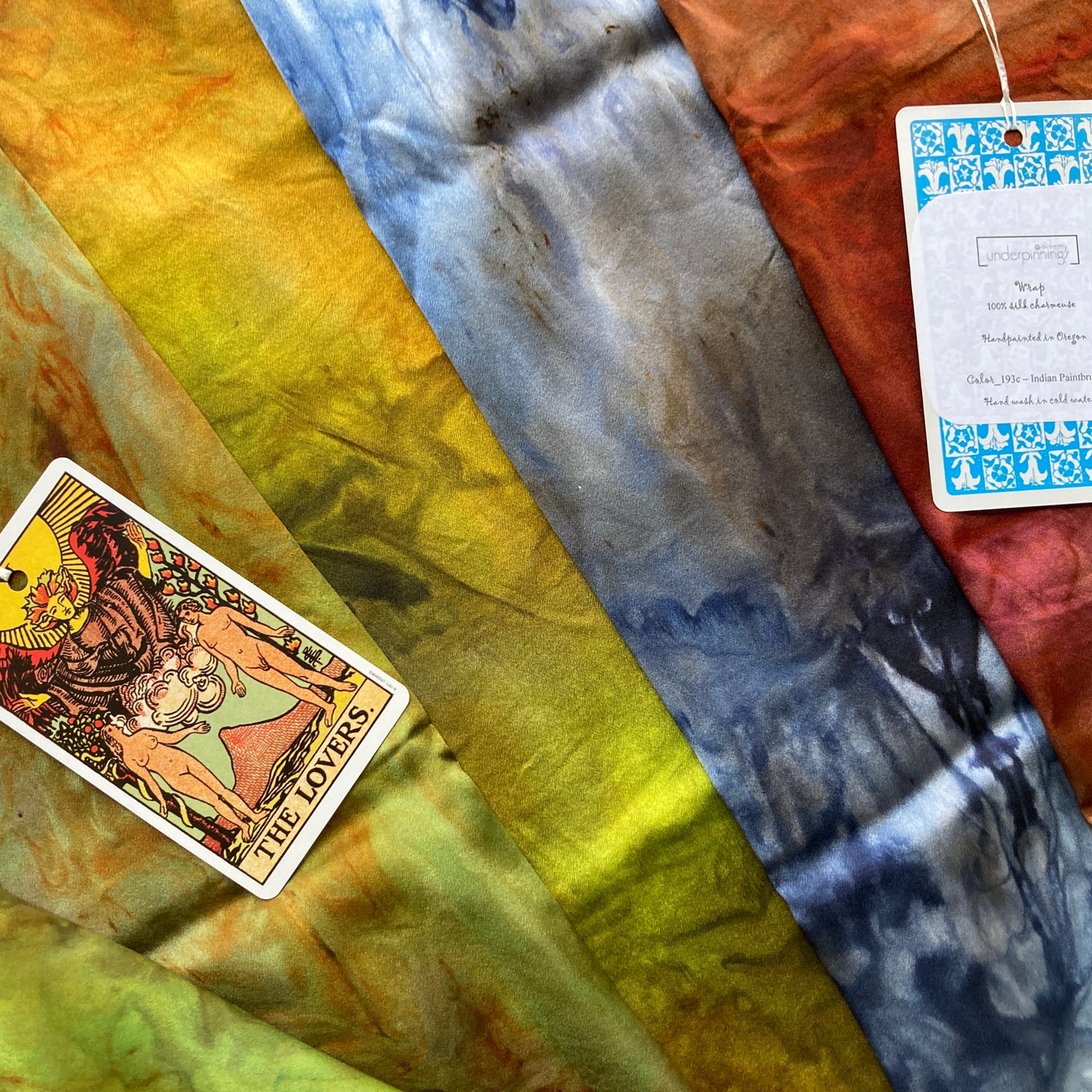 Colorful hand dyed silk wraps from Alchemy Yarns, on display at Hillsborough Yarn Shop