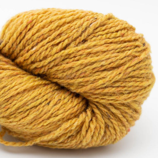 Close up on a yellow skein of BC Garn Loch Lomond yarn in color 01.
