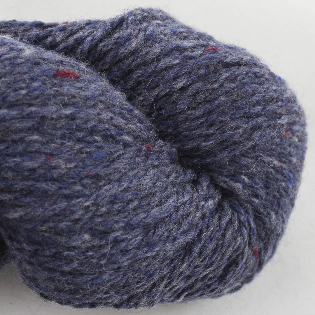 Close up on a denim blue skein of BC Garn Loch Lomond yarn color 03.