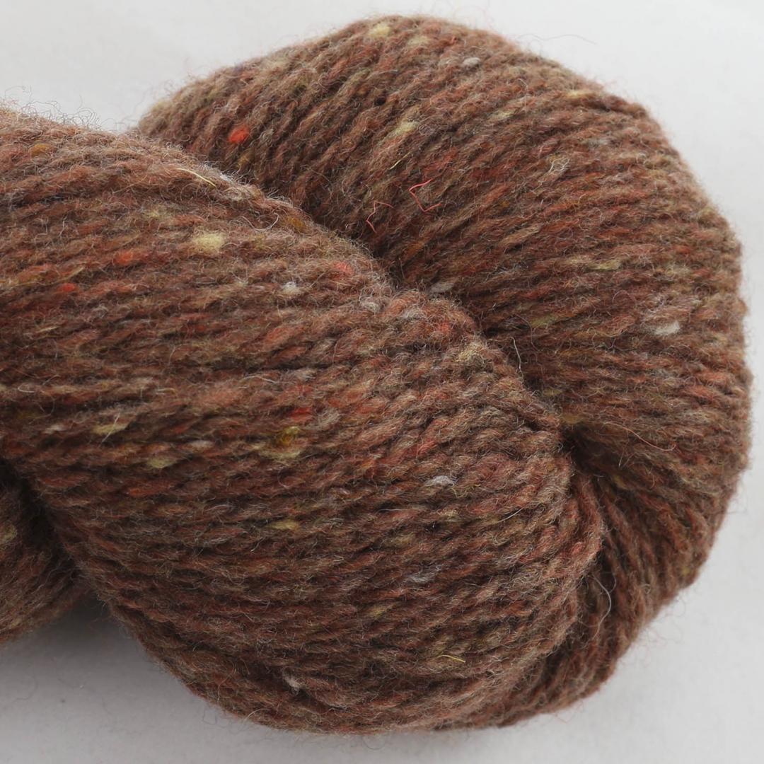 Close up on a rust skein of BC Garn Loch Lomond yarn color 04.