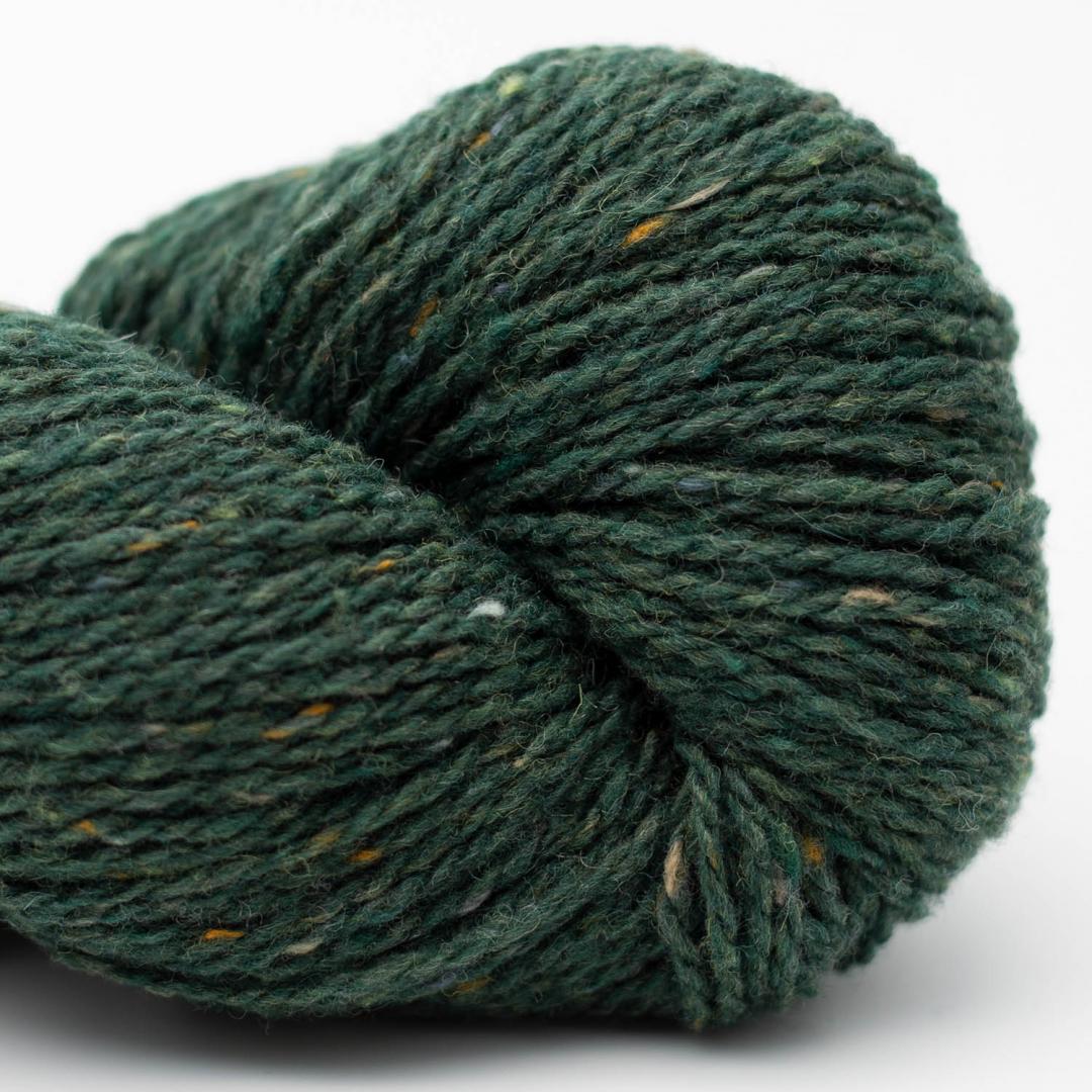 Close up on a forest green skein of BC Garn Loch Lomond yarn color 12.