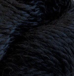 Close up on a skein of black Cascade Baby Alpaca Chunky yarn.