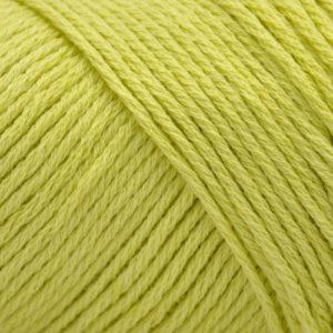Close up on an acid green skein of Brown Sheep Cotton Fleece yarn.