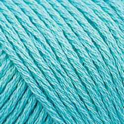 Close up on an aqua skein of Brown Sheep Cotton Fleece yarn.
