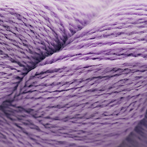 Close up on a lavender skein of Cascade 220 Fingering yarn.