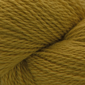 Close up on a mustard yellow skein of Cascade 220 Fingering yarn.