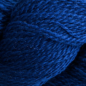 Close up on a teal blue skein of Cascade 220 Fingering yarn.