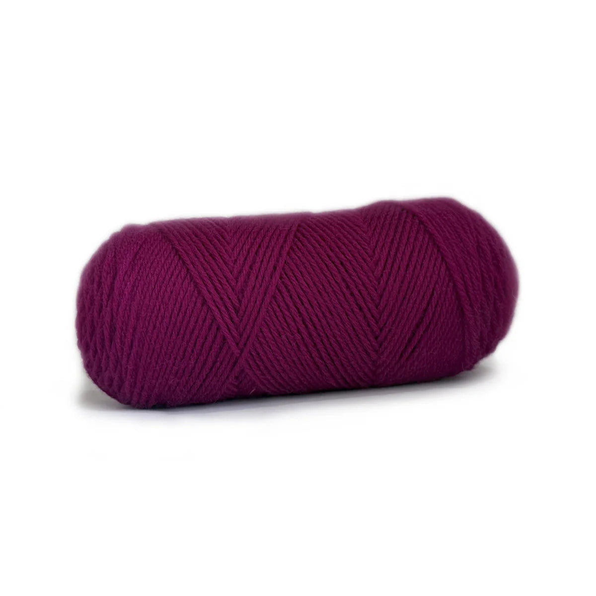 A skein of Dark Magenta Kelbourne Woolens Germantown yarn.