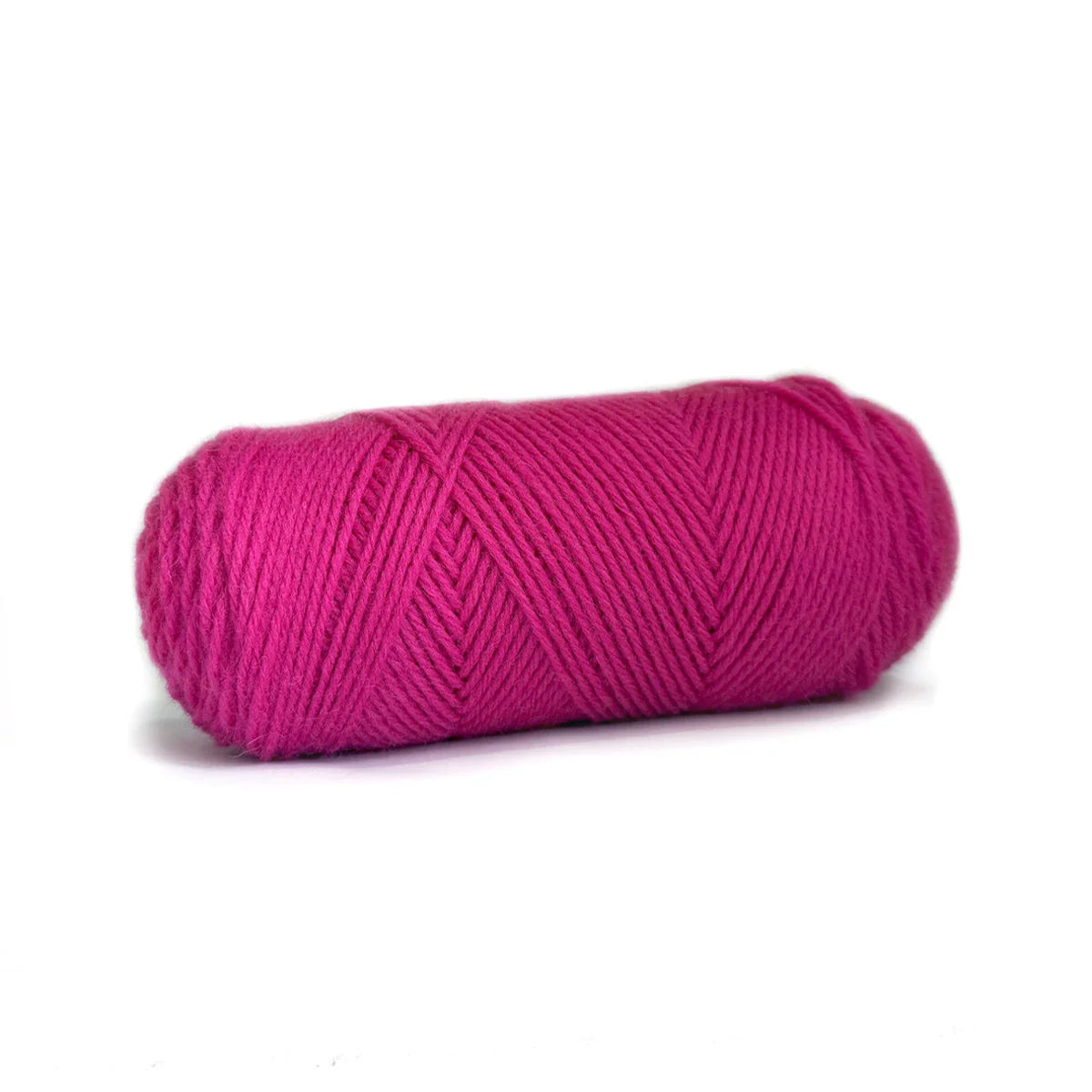 A skein of Hot Pink Kelbourne Woolens Germantown yarn.