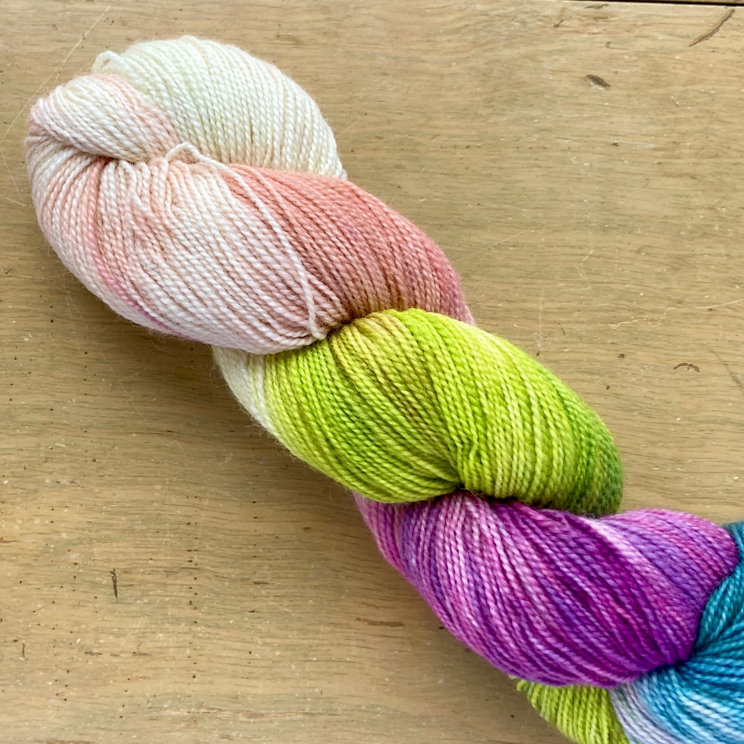 Variegated rainbow Fleece Artist / Hand Maiden yarn, colorway Lupins