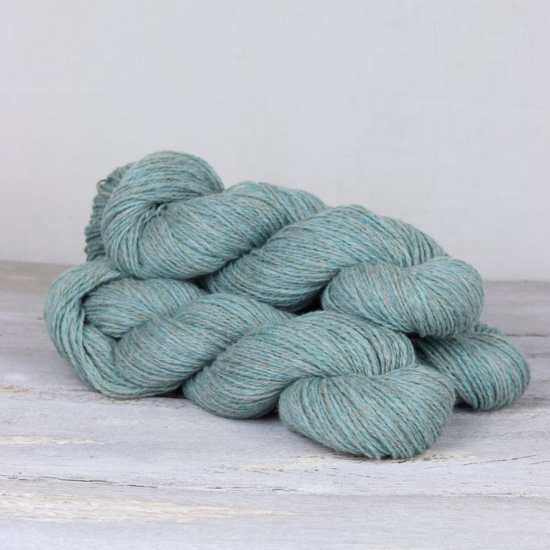 3 skeins of seafoam blue Fibre Co. Lore yarn.