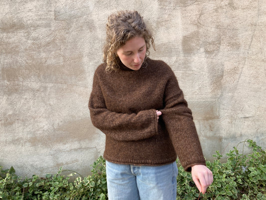 Bailey in her PetiteKnit "Cloud Sweater," knit with Isager Soft yarn in E8s, a chocolate brown