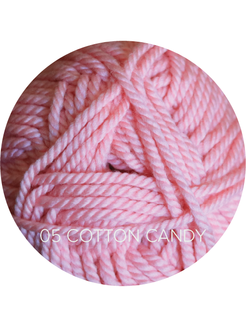 Close up on a light pink ball of Ewe Ewe Baa Baa Bulky yarn.