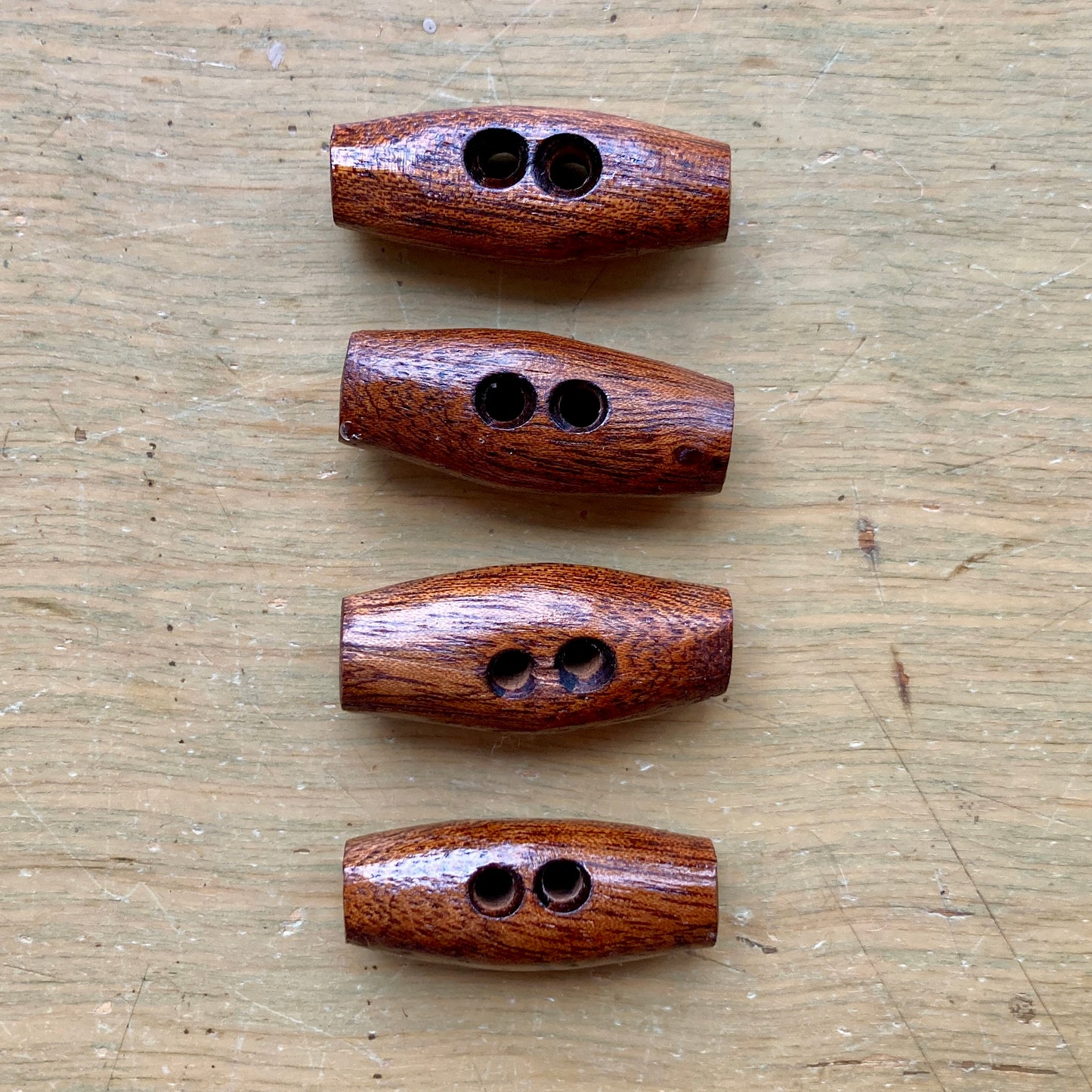 Nature’s Wonders toggle buttons in mahogany