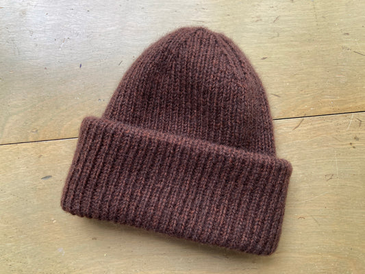 Brown fuzzy "Weekend Hat" on display at Hillsborough Yarn Shop, knit with Isager Jensen and Kelbourne Woolens Harmony yarns held together.