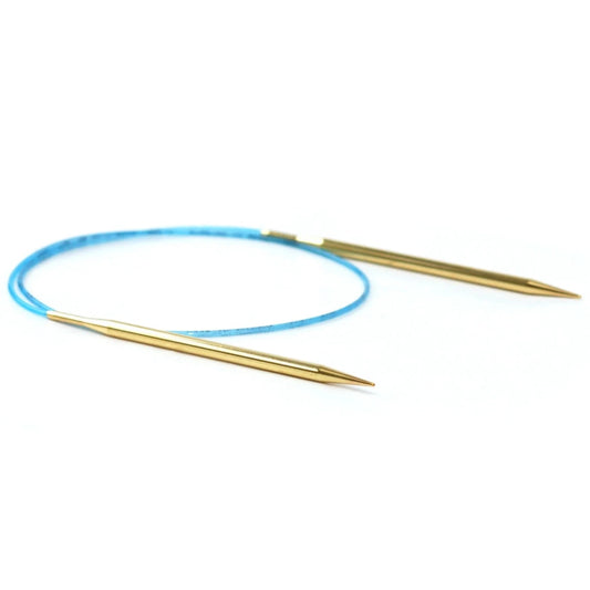 Gold circular Addi Lace knitting needles connected by a blue cord.