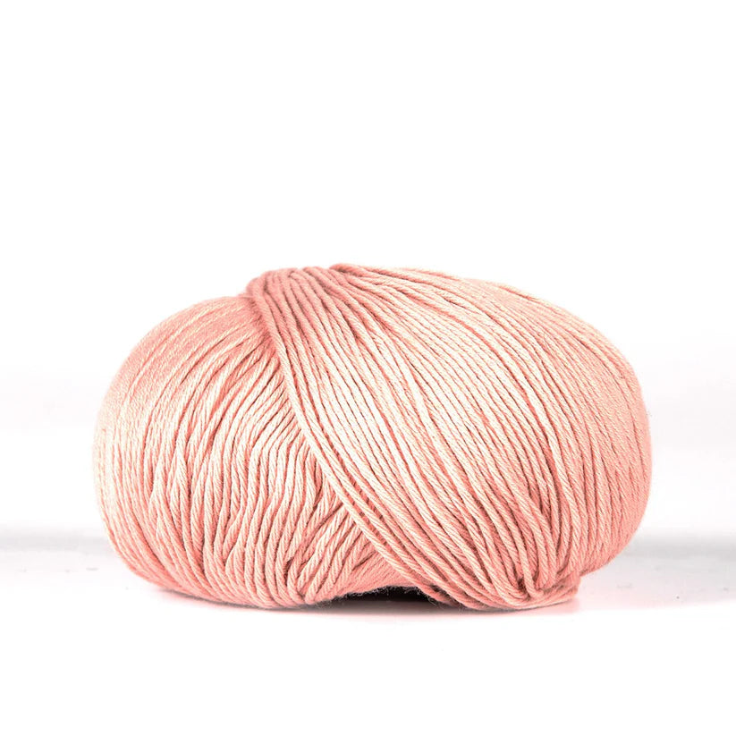 Ball of pink BC Garn Alba yarn.
