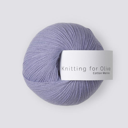 Ball of purple yarn with 'Knitting for Olive' label on a white background