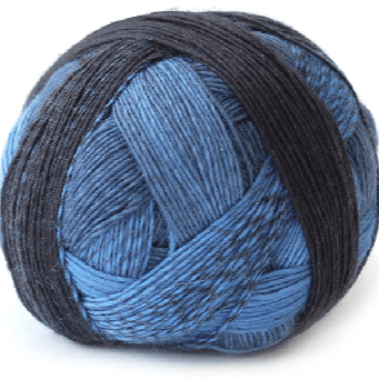One ball of Schoppel-Wolle lace merino yarn in blue ombré.