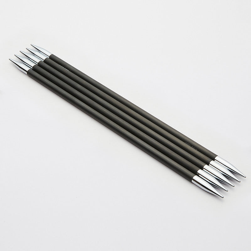 Set of five black Karbonz double pointed needles with silver tips.