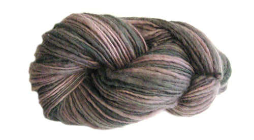 Brown and gray skein of Manos del Uruguay Wool Clásica yarn.