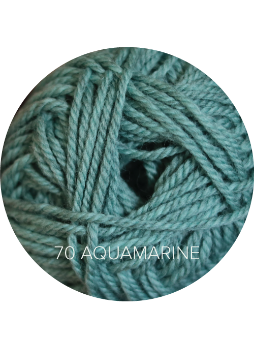 Close up on a seafoam ball of Ewe Ewe Heather’s Heathers yarn.