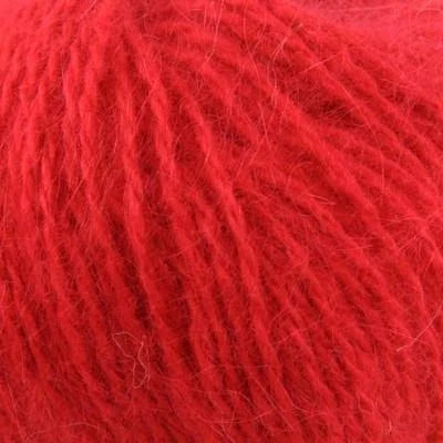Close up on ball of bright red Plymouth Angora yarn.