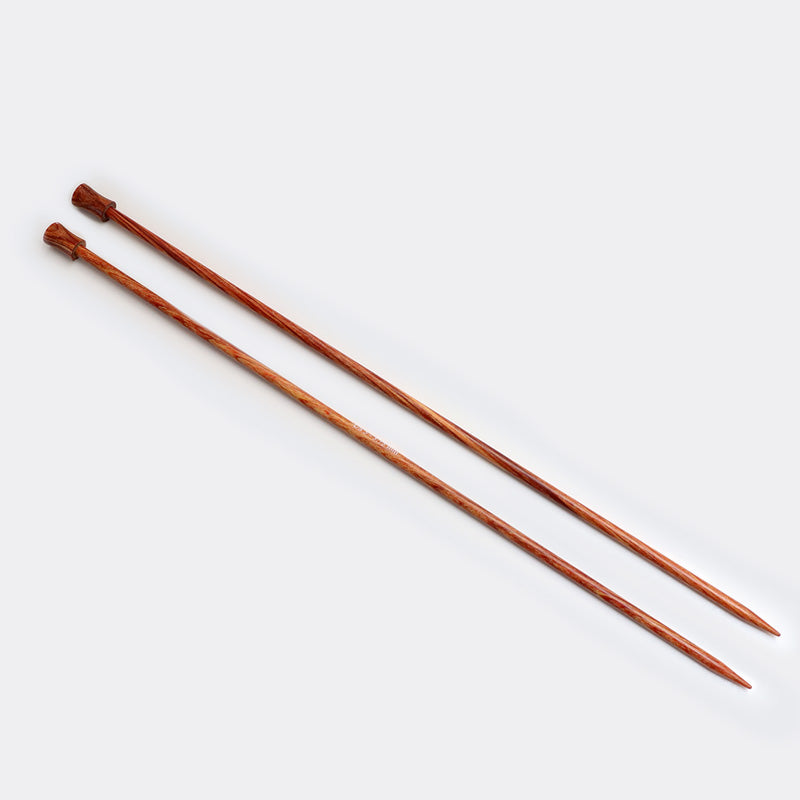Pair of golden yellow Dreamz single pointed needles.