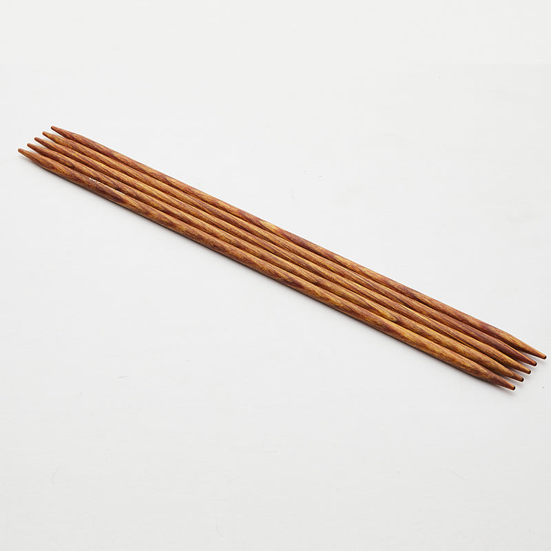 Set of 5 gold yellow Dreamz double pointed needles.