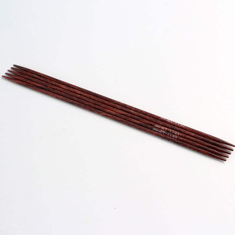Set of 5 brown Dreamz double pointed needles.