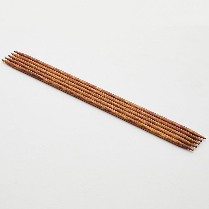 Set of 5 yellow Dreamz double pointed needles.