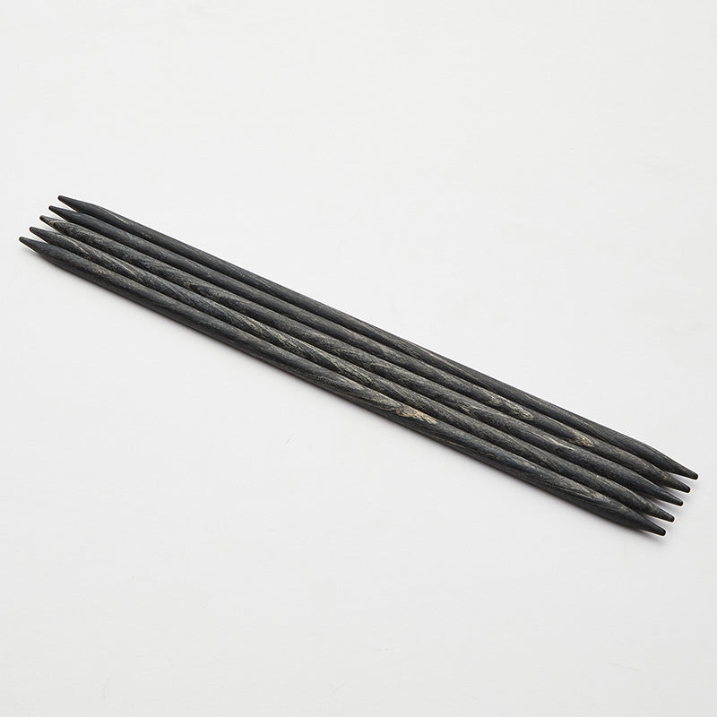 Set of 5 gray Dreamz double pointed needles.