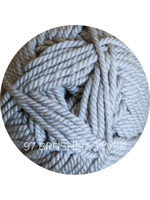Close up on a light gray ball of Ewe Ewe Baa Baa Bulky yarn.