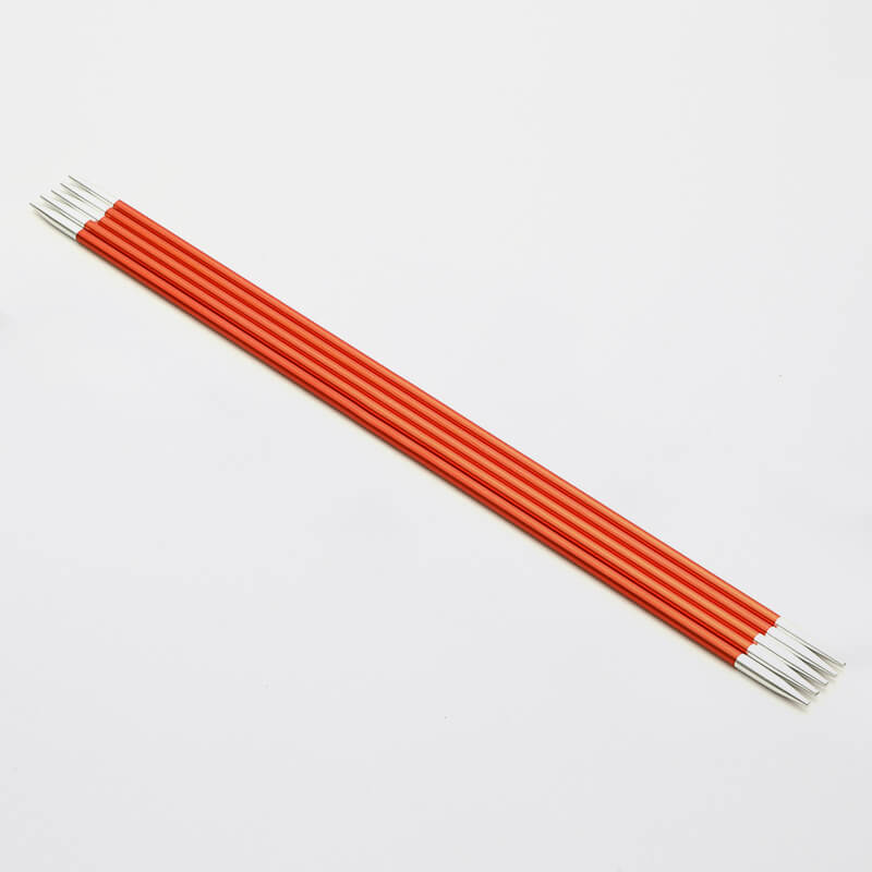 Set of 5 orange Zing double pointed neeedles with silver tips.