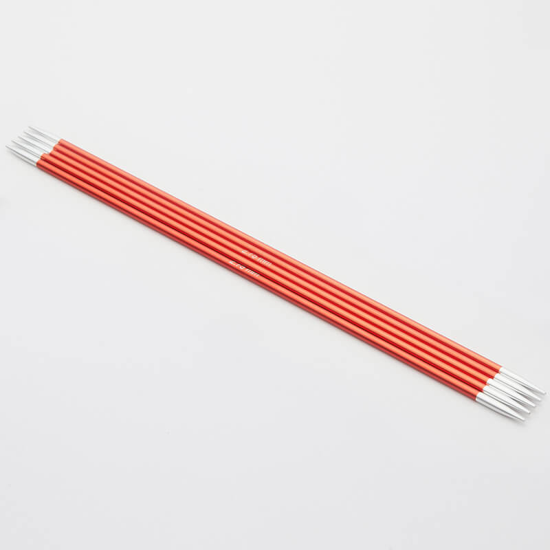 Set of 5 red Zing double pointed neeedles with silver tips.