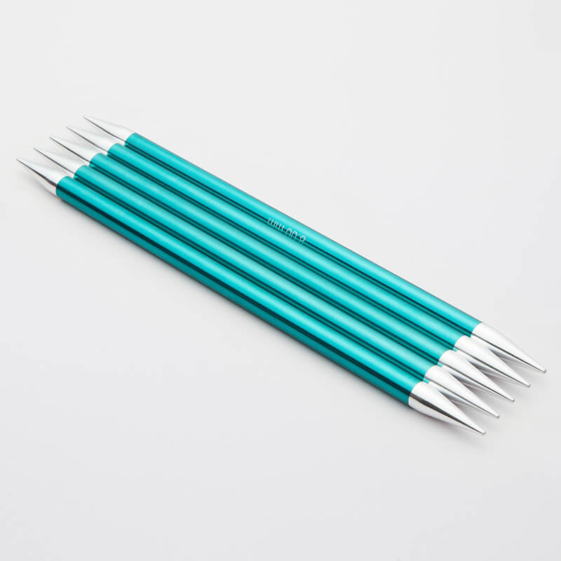 Set of 5 turquoise Zing double pointed neeedles with silver tips.