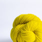 Pollen yellow ball of Brooklyn Tweed Loft yarn. 