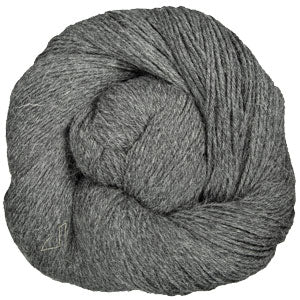 3 skeins of dark gray Fibre Co. Cumbria Fingering yarn. 