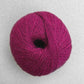 Ball of magenta Pascuali Balayage yarn. 