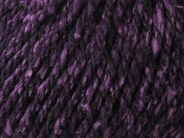 Close up on deep purple ball of Elsebeth Lavold Silky Wool XL yarn. 